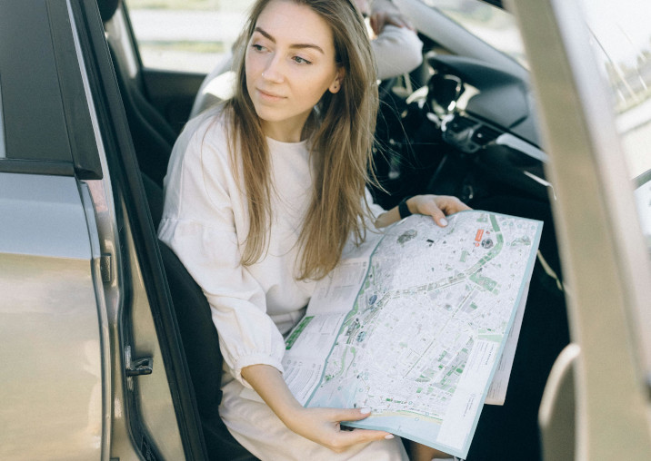 map in passenger seat looking for notary public