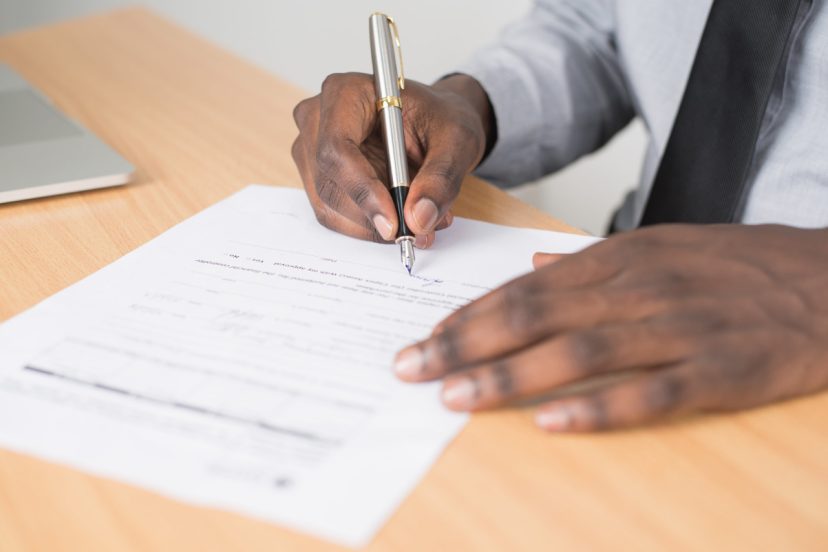 sign paperwork to be notarized