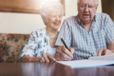 Senior couple signing cpp statutory declaration of common law union